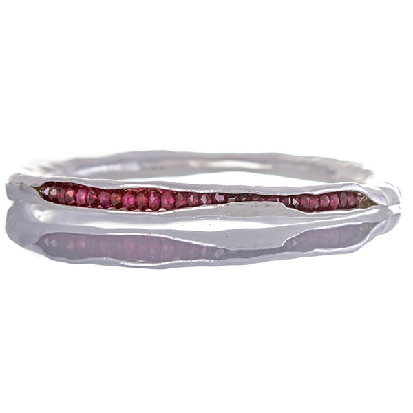 Silver pod bangle with garnet