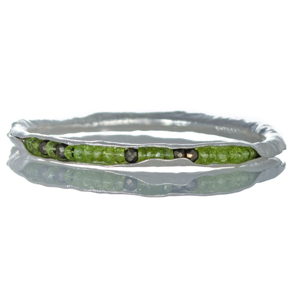 Silver pod bangle with peridot and pyrite