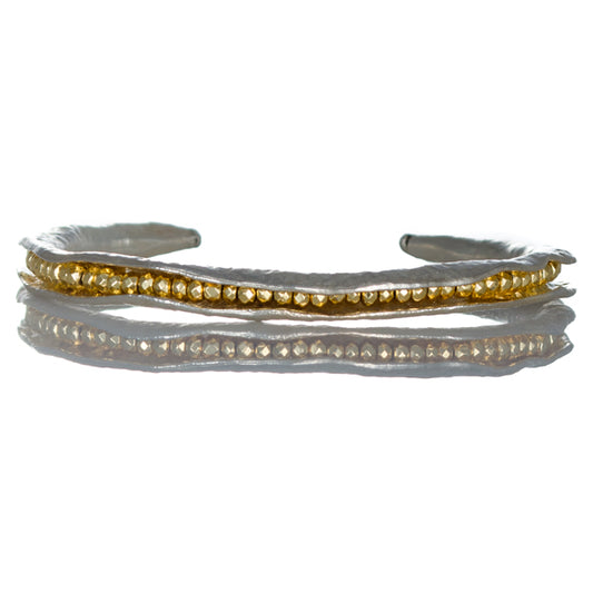 Silver pod cuff with gold pyrite